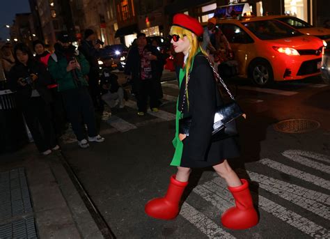 The Internet Is Obsessed with These Big Red Boots. Here’s Why